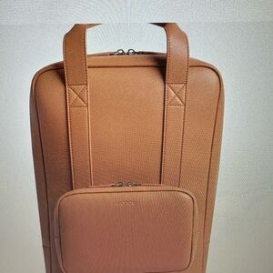 Monos Metro Backpack Stylish Saddle Tan Vegan Leather with Metro Toiletry